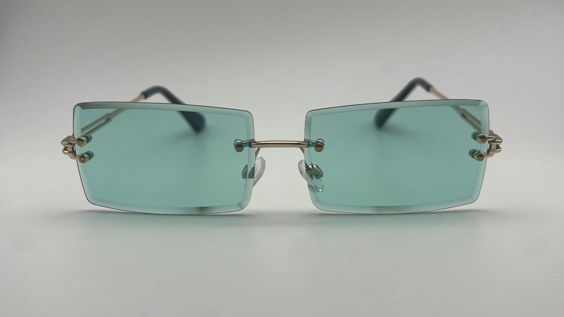 Lunettes de Soleil Sans Monture — Verres Vert d’Eau